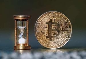 Bitcoin y un reloj de arena
